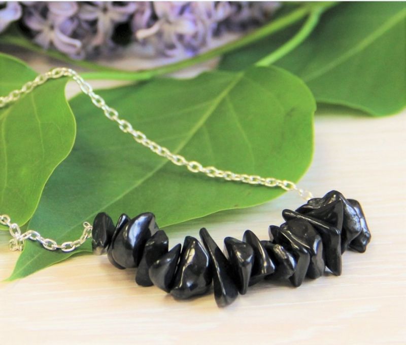 Shungite necklace on a chain with small shungite tumbled stones